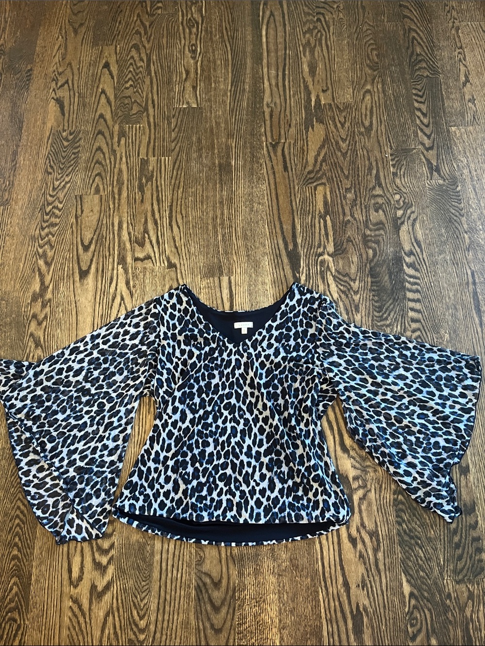 Leopard Print V-Neck Bell Sleeve Blouse in Black and White